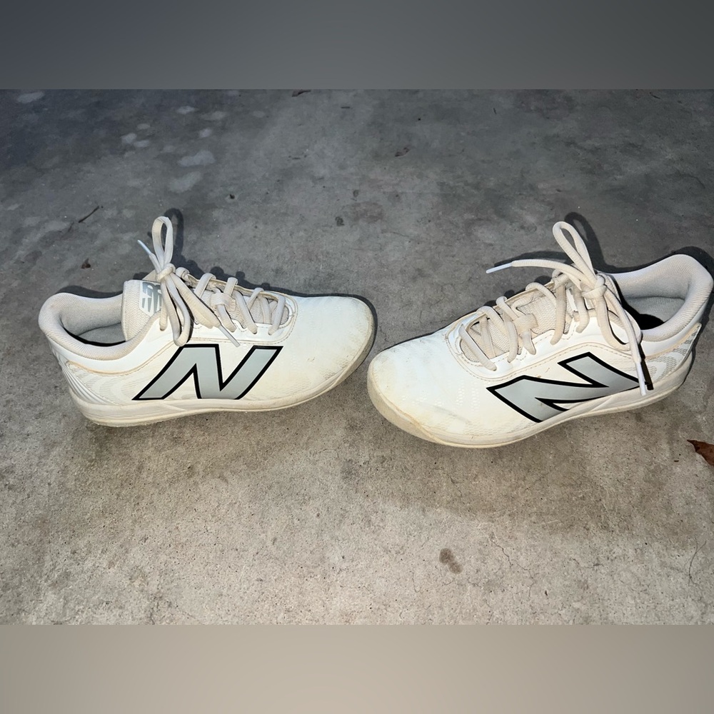 New Balance Kids white and Black Cleats